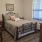 large window brightens bedroom