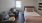 bedroom with sitting area next to window