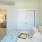 carpeted bedroom with closet